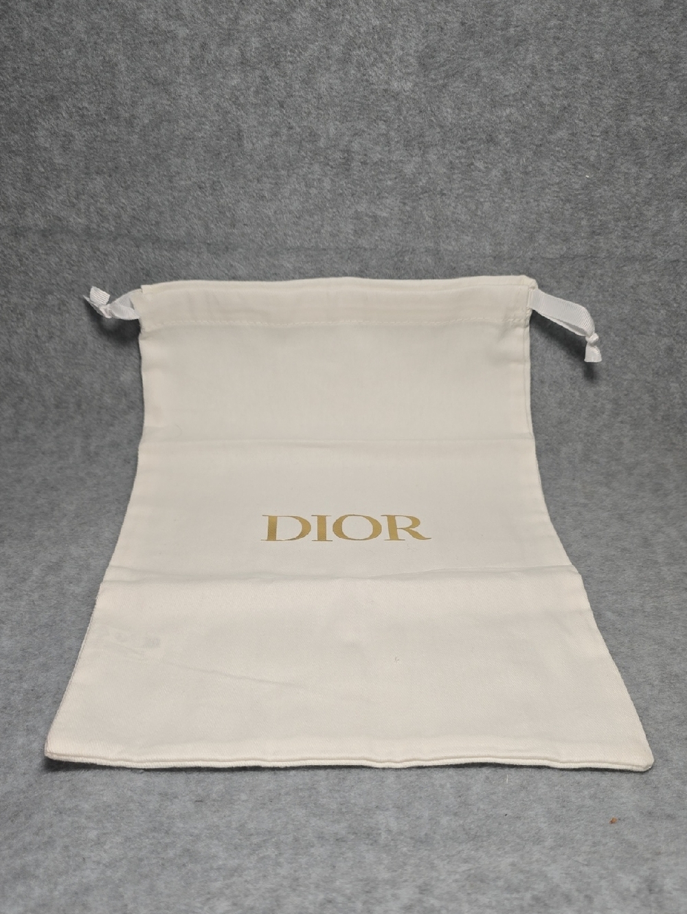 Dior Cream Drawstring Pouch with Gold Logo